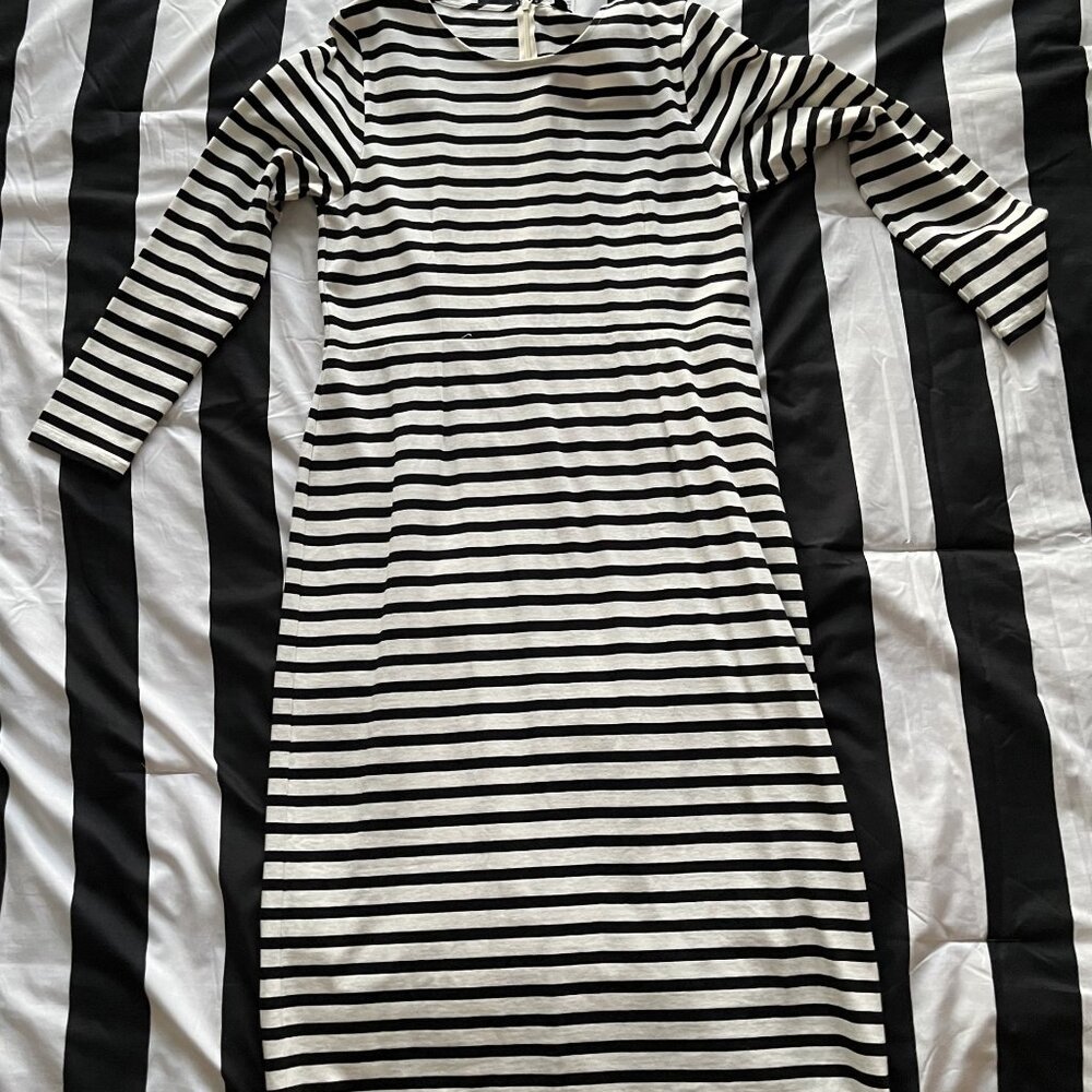 Timeless chic from J. Crew and still waiting for its debut.  Midi dress size XL